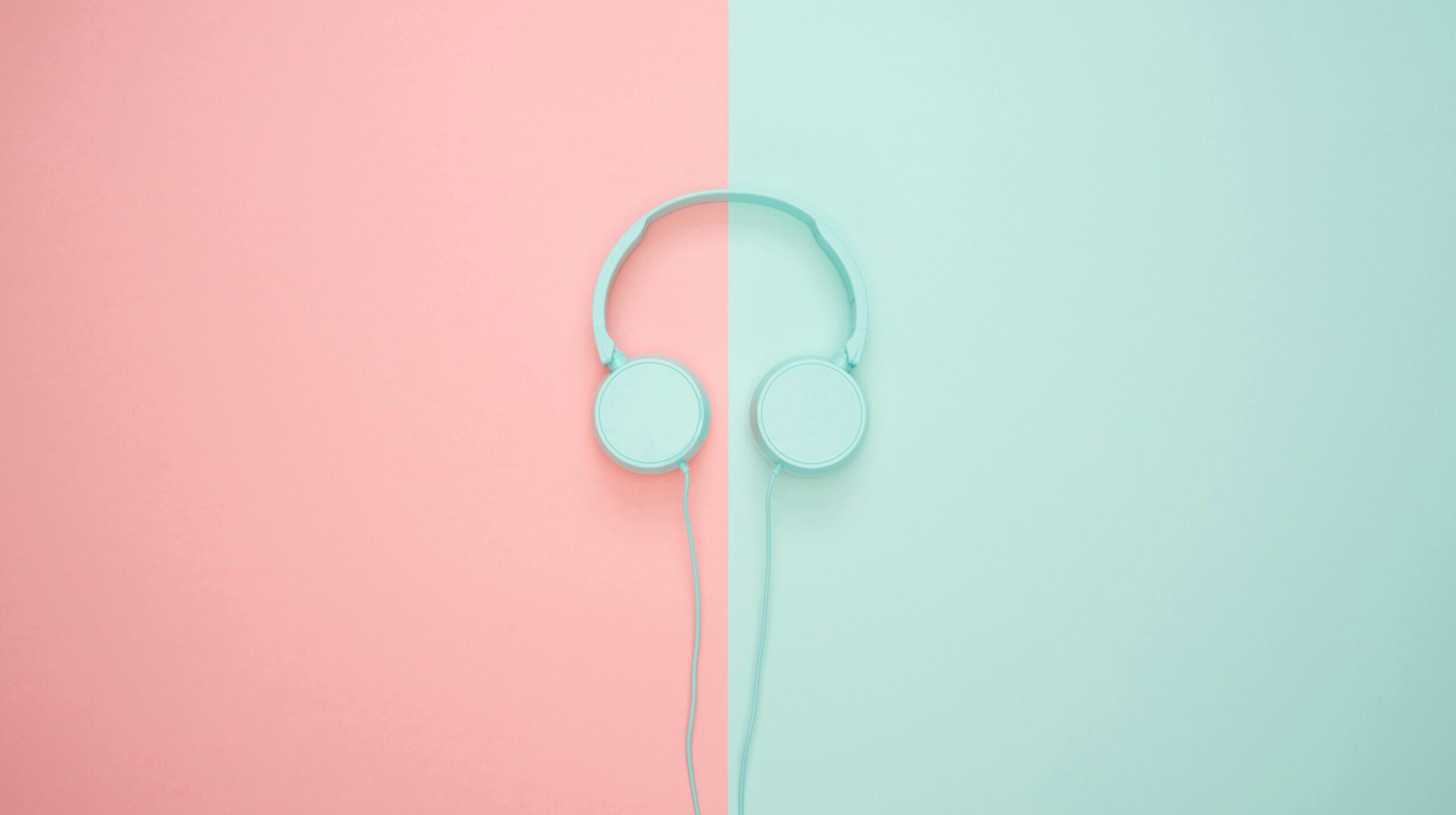Wireless headphones on colorful backdrop